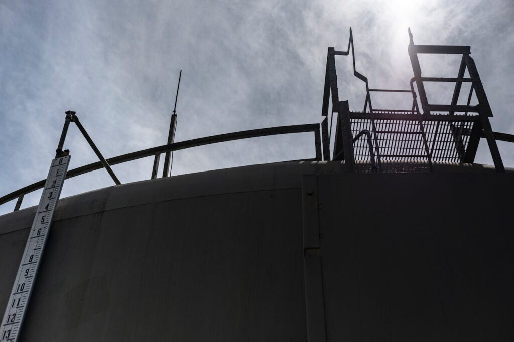 Low Angle Shot of a Structure Under White Clouds